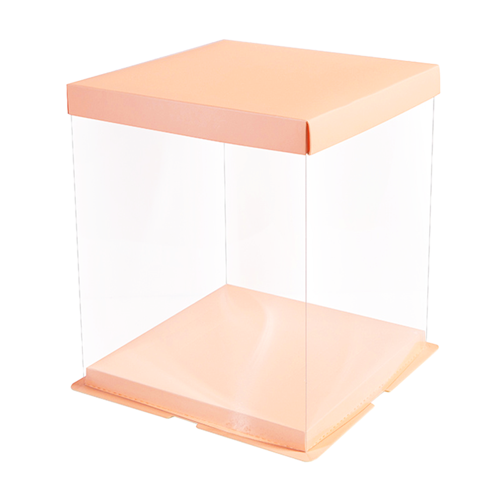 Clear acrylic box with peach-colored lid and base on a white background