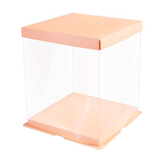 Clear acrylic box with peach-colored lid and base on a white background
