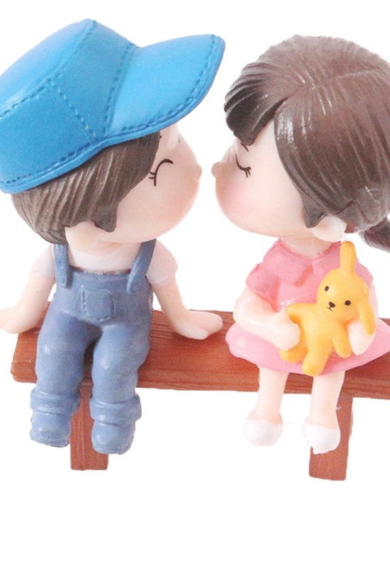 Kissing Boy & Girl On Chair Cake Topper Set